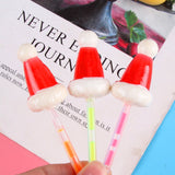 Multi-Colored wholesale snacks Christmas Hat fluorescent lollipop creative food for students during the holiday season